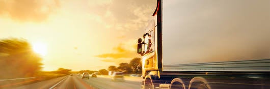 Truck traffic transport on highway in motion